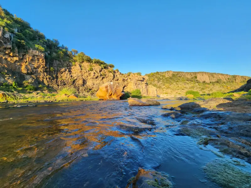 Rocky river gorge with crystal clear water